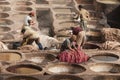 FEZ, MOROCCO Ã¢â¬â FEBRUARY 20, 2017 : Men working at the famous Chouara Tannery in the medina of Fez, Morocco Royalty Free Stock Photo